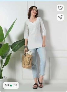 Elegant White Embroidered Kurti