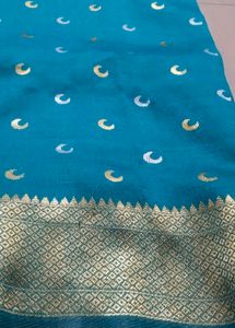 Beautiful Teal Saree with Pink Border