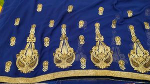 Elegant Royal blue net saree golden embroidery