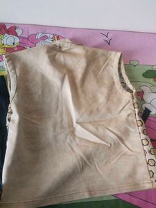 Stylish Black Jeans and cream vest