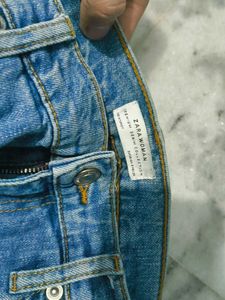 Ripped Knee Jeans