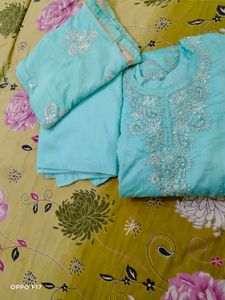 stitched suit with zipper storage  packet.