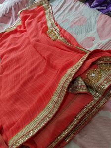 Beautiful Orange/coral Saree with Golden Border