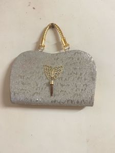 Silver Clutch with Butterfly Detail