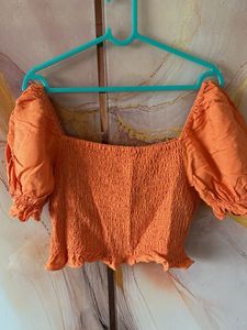 Orange Smocked Puff Sleeve Top