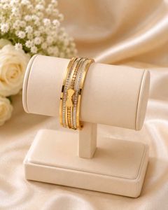 Elegant Gold Tone Bracelet with Crystals