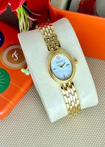 Gucci Gold &amp; Green Watch