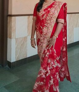 A Pretty Red Colour Net Embroidered Saree