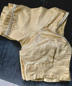 Golden tissue blouse with extra border work