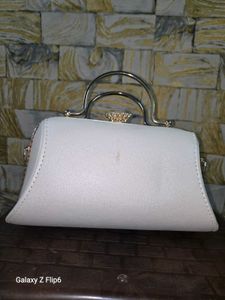 Elegant White Clutch with Embellishments