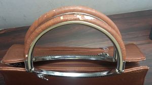 Chic Brown Handbag with Ring Handle