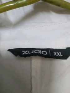 Stylish white Zudio top paired with black slim-fit