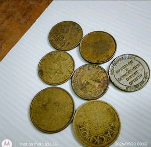 set of 7 used vintage Collectible tokens