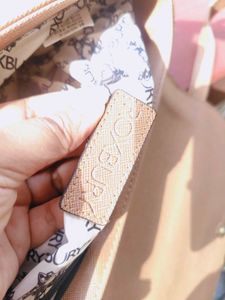Roxbury brown sling bag