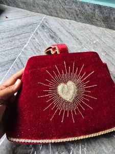 Elegant Red Velvet Clutch with Heart Design