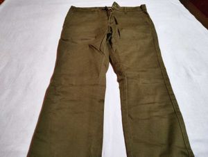 olive green or subtle brown shade pant of 32 size