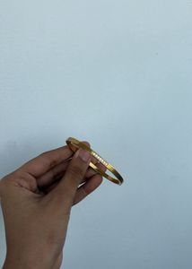 Elegant Gold Bangle with Crystals