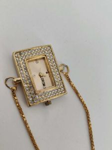 Elegant Gold Watch with Pearl Detail