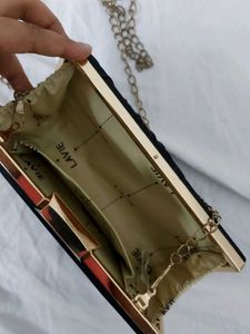 Elegant Black Clutch with Gold Chain