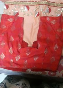 Elegant Peach Saree with Red Border