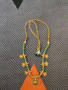 Traditional Gold Necklace with Green Beads
