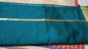 Elegant Teal Saree with Gold Border