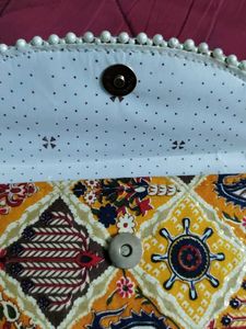 Boho Clutch with small beads.