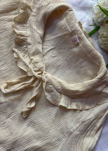 Cream Textured Top with Ruffled Collar