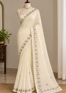 90s Shimmer Cream Saree with Intricate Border