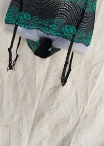 I. Black net garter