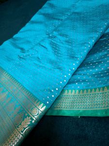 Beautiful Teal Saree with Gold Border