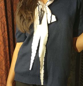 Chic Navy Top with Bow Detail