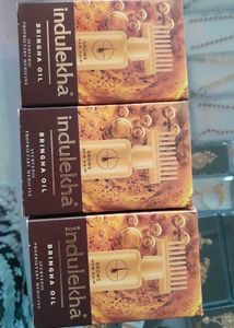 trio of indulekha oil