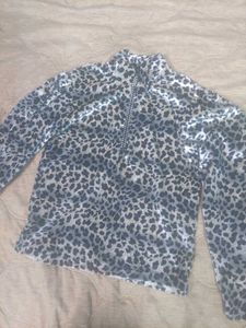 Shimmer Leopard Print Zip Neck Top