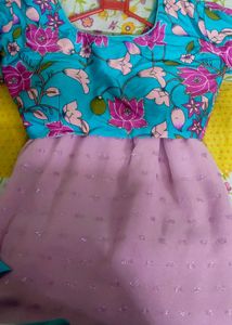 Elegant Pink Saree with Floral Blouse