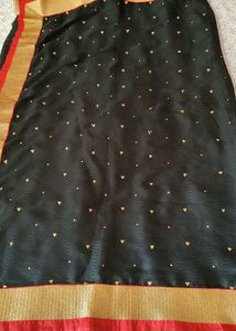 Elegant Black Saree with Gold Border