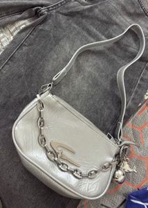 Chic White Shoulder Bag with Charms