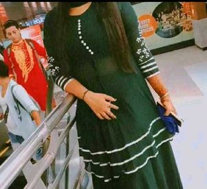 Elegant Dark Green Kurta with White Accents