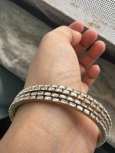 Sparkling Cz Bangle set in dull gold— 4 pcs