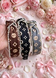 🆕Pearl Embellished Knotted Headbands