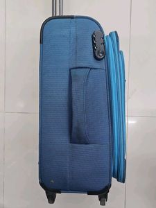 Blue Rolling Carry-On Suitcase