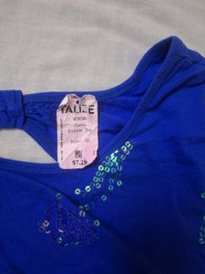 Sequin with unique design Top Tunic girl frm spain