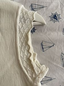 Cream Ribbed Sweater with Lace Neckline