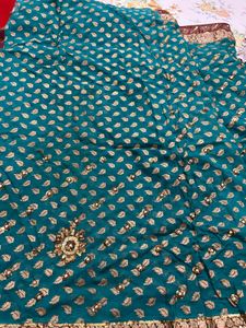 Stunning Teal Saree with Golden &amp; Red Border