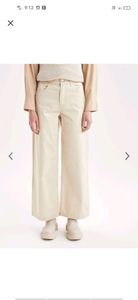 Beige flared jeans women