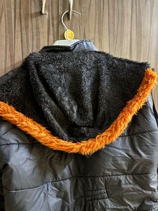 Stylish Black Puffer Jacket with Fur Hood