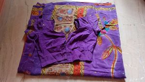 Vibrant Purple Saree with Floral Embroidery