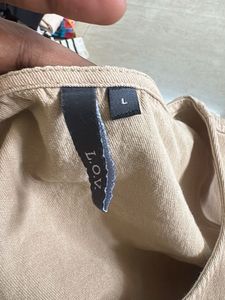 Lightweight Sleeveless Button-Up Top