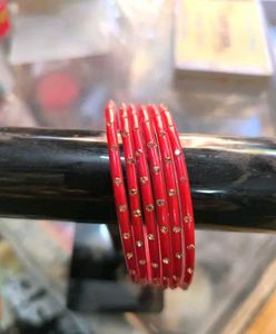 Elegant Green Glass Bangles with Gold Dots