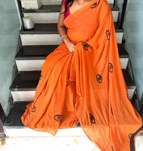 Evil eyes  Vibrant Orange Saree with Eye Print
